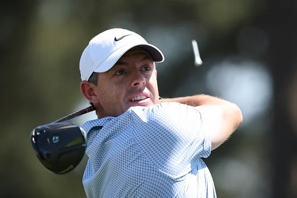 Close view of Rory McIlroy following through on a drive