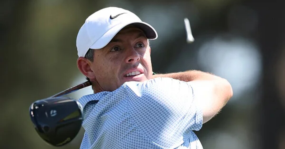 Close view of Rory McIlroy following through on a tee shot